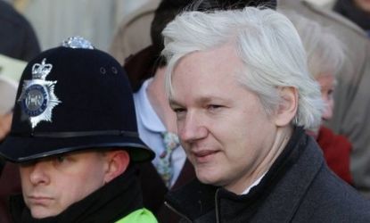 Julian Assange arrives at the Supreme Court on February 1 in London: The Wikileaks founder is now under asylum at Ecuador's embassy in London, which is a violation of the terms of his bail.