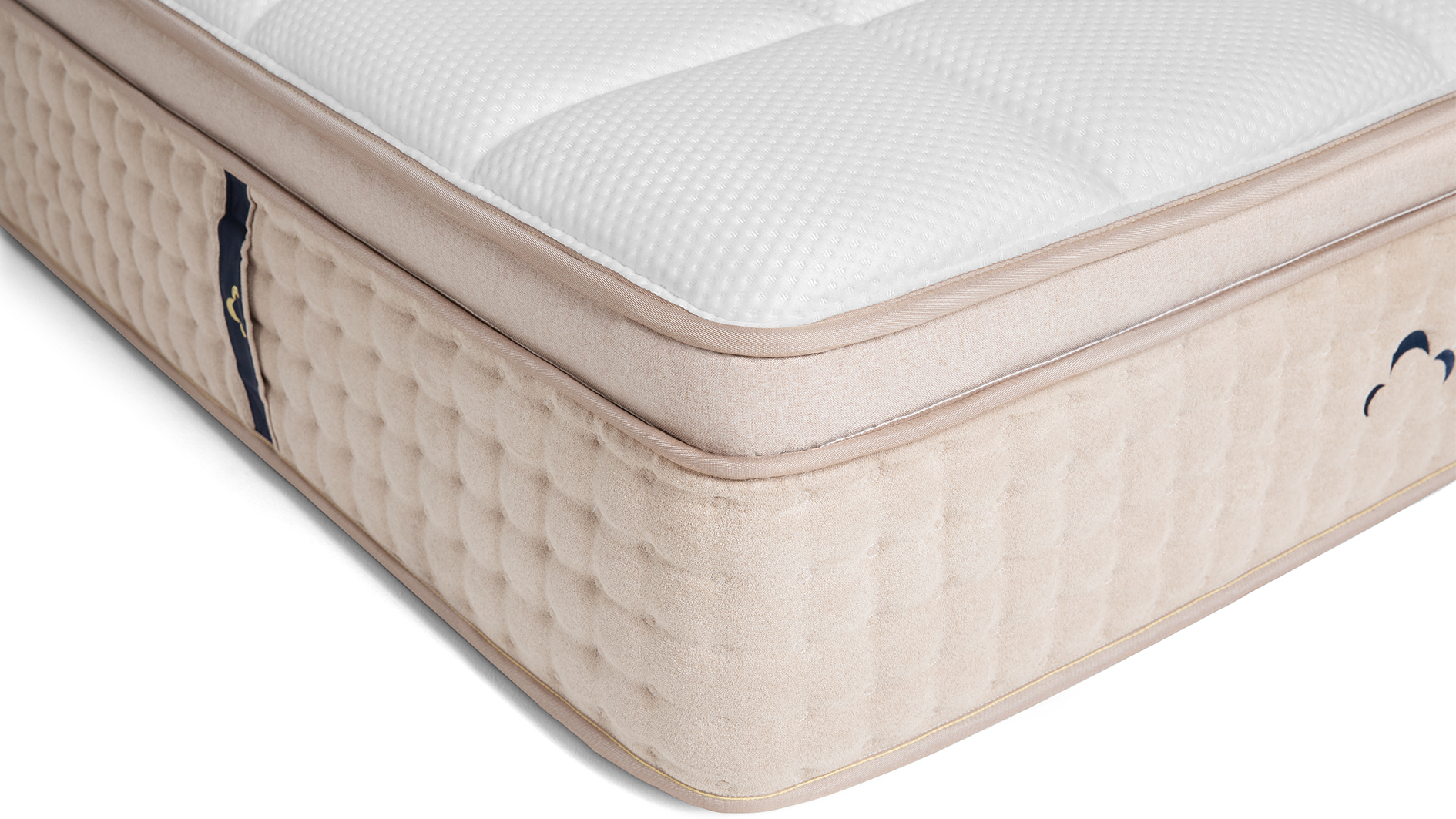 The DreamCloud Luxury Hybrid mattress review: image shows the strong edge support at one corner of the mattress