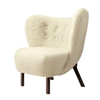 A sherpa wingback armchair