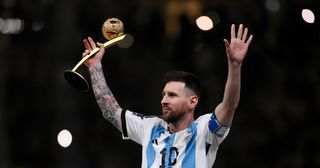 Lionel Messi wins the Golden Ball at World Cup 2022: Lionel Messi of Argentina poses with the adidas Golden Ball trophy at the award ceremony following the FIFA World Cup Qatar 2022 Final match between Argentina and France at Lusail Stadium on December 18, 2022 in Lusail City, Qatar.