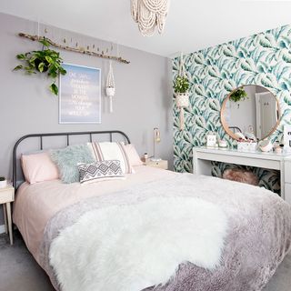 bedroom with floral wallpaper