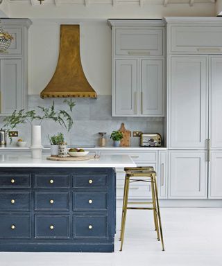 traditional kitchen with blue kitchen island cabinets