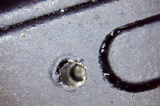 Sim card tray and ejector hole