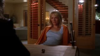 Uma Thurman with a sword at her side in Kill Bill Vol. 2