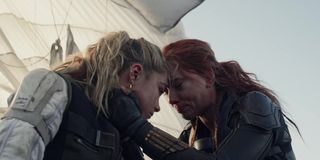 Florence Pugh and Scarlett Johansson put their foreheads together in Black Widow