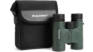 Celestron Nature DX 8x32 binoculars on a white background