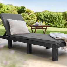 Lidl wicker sun lounger on a patio.