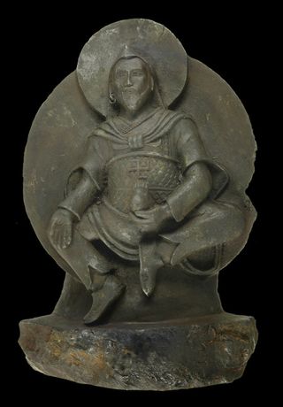 A Buddha statue possibly dating back to the 8th to 10th centuries A.D. is carved from a rare iron meteorite.