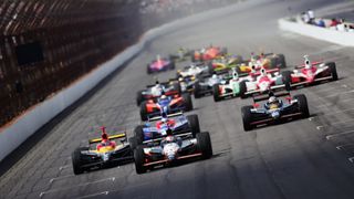 Michael Andretti leads the Indy 500 race