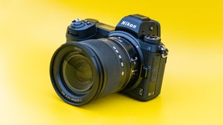 Nikon Z7 II camera on a yellow background