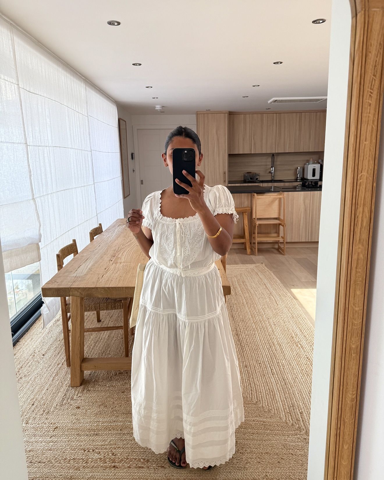An image of @monikh wearing one of the key summer dress trends for 2025.