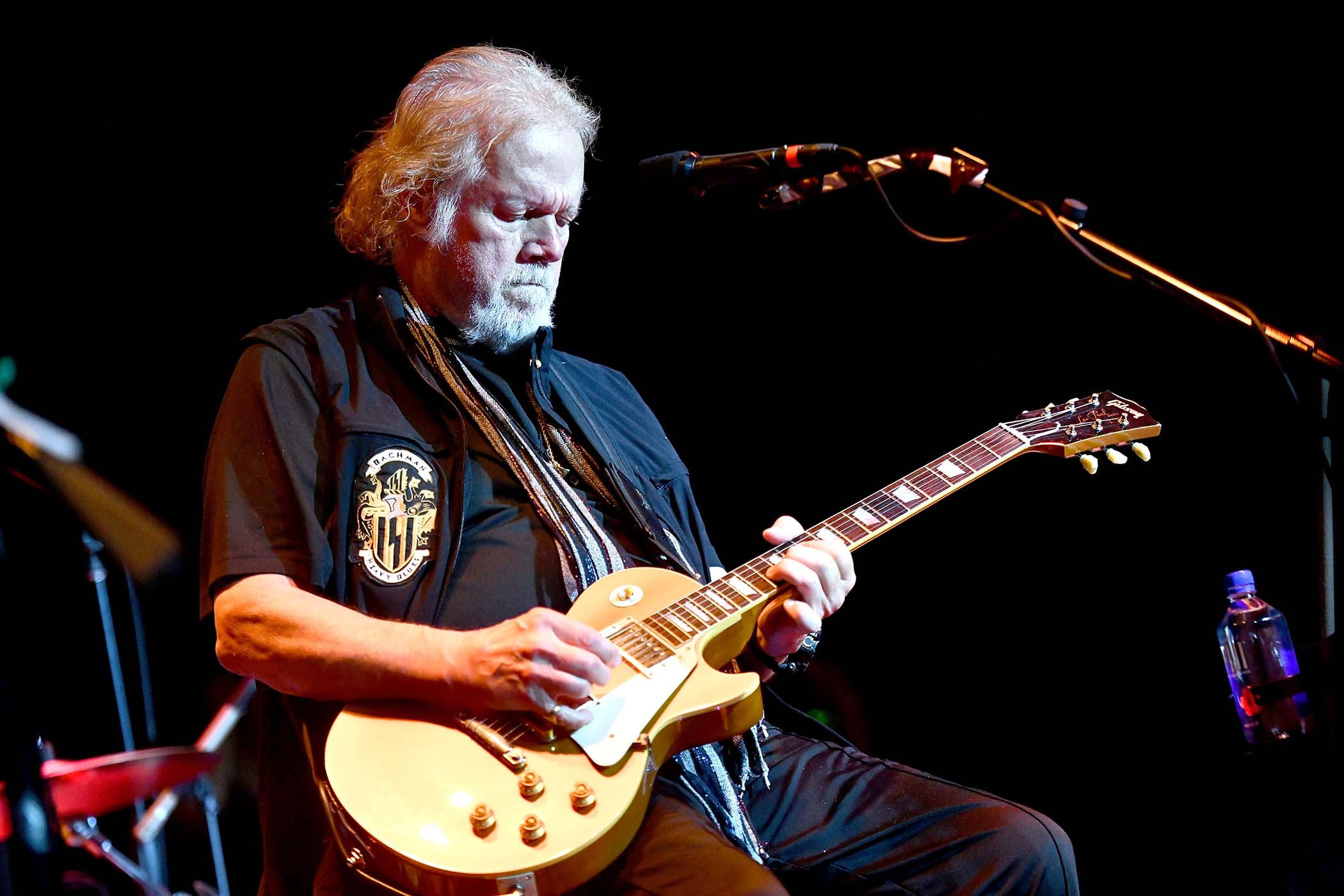 Randy Bachman plays a Goldtop Les Paul onstage.