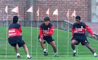 Johnny Vegas (right) in Peru training alongside Paolo Maldonado and Roger Serrano in July 2000.