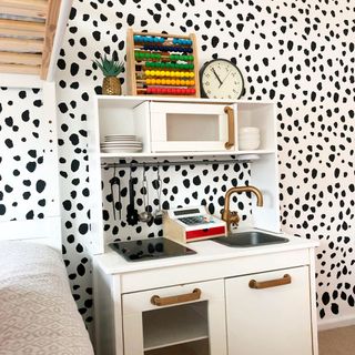 dalmation bedroom with black spot on white walls