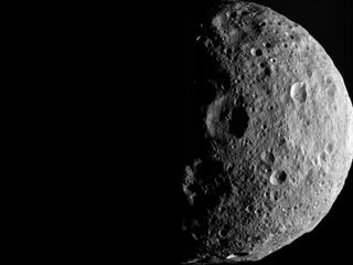 The shadowy outlines of the terrain in Vesta's northern region are visible in this image from NASA's Dawn spacecraft. The image comes from the last sequence of images Dawn obtained of the giant asteroid Vesta as it departed the giant asteroid Sept. 5, 2012.