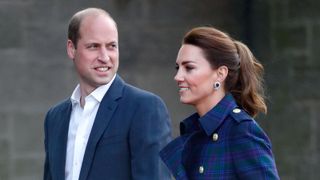 Prince William and Kate Middleton smile as they host a drive-in cinema screening of Disney's 'Cruella' for Scottish NHS workers at The Palace of Holyroodhouse on May 26, 2021 in
