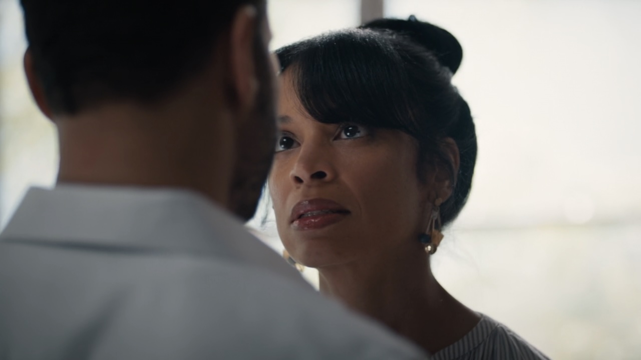 Lucia looking into Karadec's eyes in High Potential Season 2