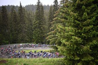 TOPSHOT The pack rides during the 9th stage of the 108th edition of the Tour de France cycling race 144 km between Cluses and Tignes on July 04 2021 Photo by AnneChristine POUJOULAT AFP Photo by ANNECHRISTINE POUJOULATAFP via Getty Images