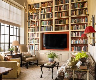 library with ceiling high bookshelves and textured wallcovering