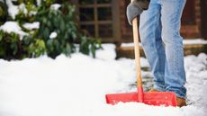 A close up of shoveling snow Getty Images 174836008