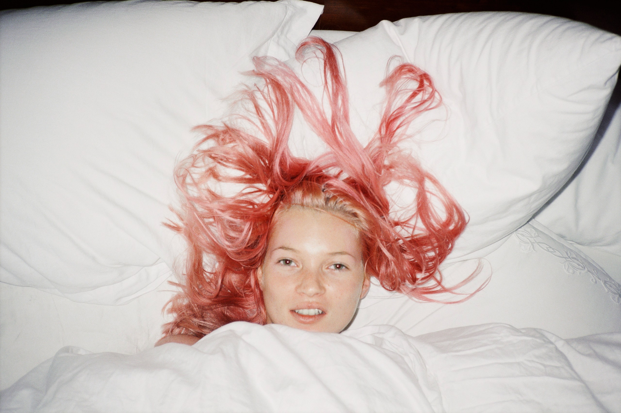 Kate Moss with pink hair photographed by Juergen Teller