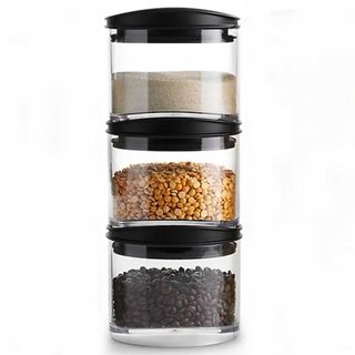 Stackable glass jars for food to show how to organise kitchen cupboards