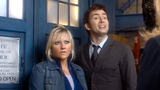 Jackie and The 10th Doctor standing outside the TARDIS.