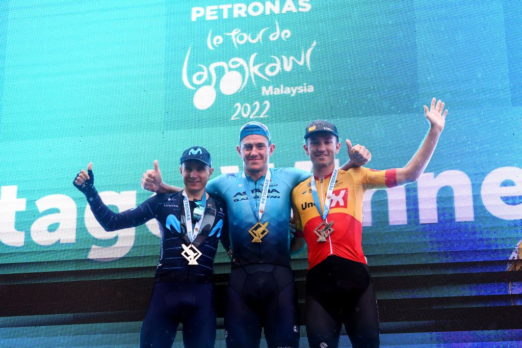 KUALA LUMPUR MALAYSIA OCTOBER 11 LR Max Kanter of Germany and Movistar Team on third place stage winner Gleb Syritsa of Russia and Astana Qazaqstan Team and Erlend Blikra of Norway and UnoX Pro Cycling Team on second place pose on the podium ceremony after the 26th Le Tour de Langkawi 2022 Stage 1 a 1573km stage from Kuala Pilah to Kuala Lumpur PETRONASLTdL2020 on October 11 2022 in Kuala Lumpur Malaysia Photo by Tim de WaeleGetty Images