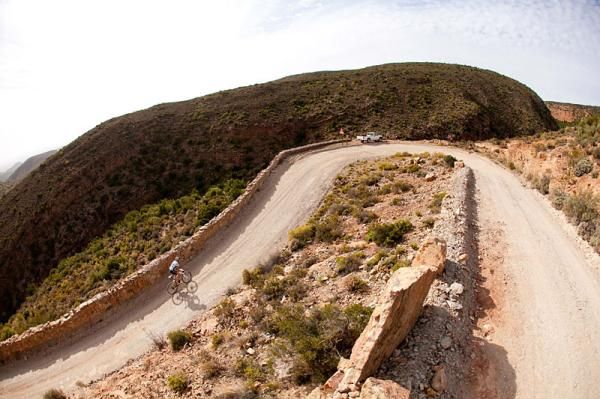 A rider breaks away from the bunch on Rooiberg Pass during stage 2