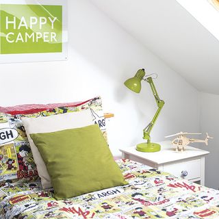 boys room with beano bed linen and happy camper sign