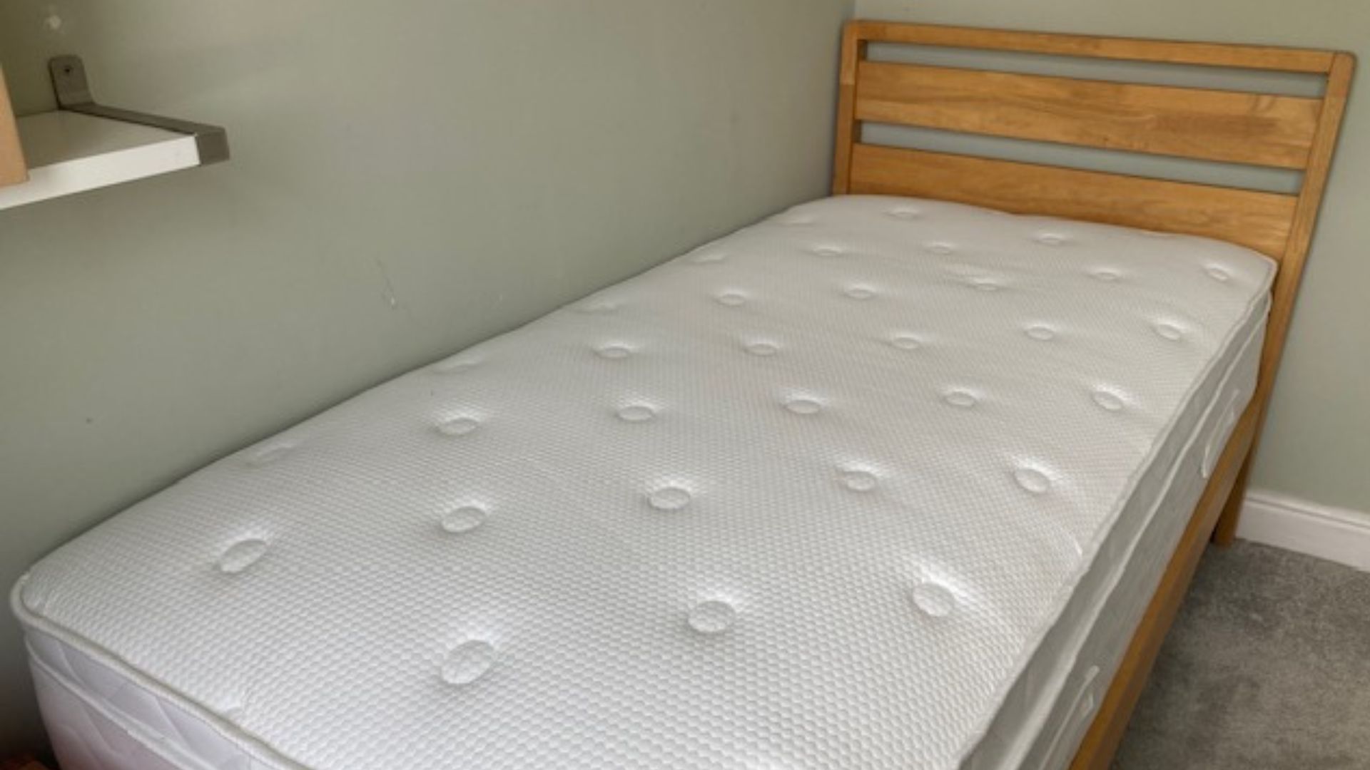 Evermore 1500 Pocket Spring Foam Hybrid Mattress in our tester, Linda's bedroom on a wooden bed frame