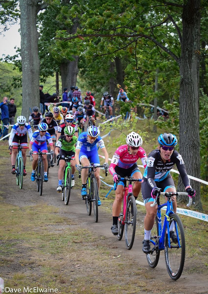Caroline Mani (Raleigh Cement) leading the women through the woods at the end of the start loop