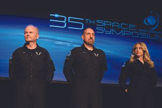 The three-person crew of Virgin Galactic's second flight to soar past 50 miles in altitude received their commercial astronaut wings on April 9, 2019.