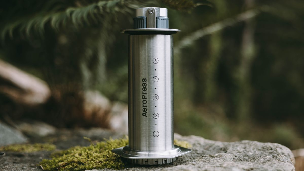 AeroPress Steel coffee maker with manual coffee grinder inside