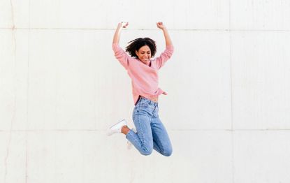 woman jumping for joy