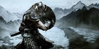 The Dragonborn draws his sword in Skyrim.