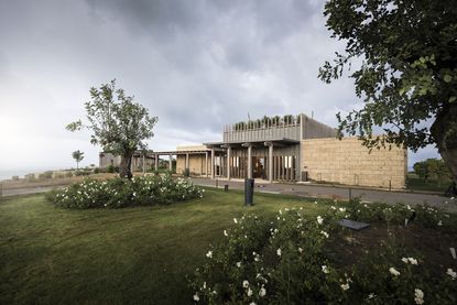 Adler spa resort Sicily with its low, timber volumes and green context