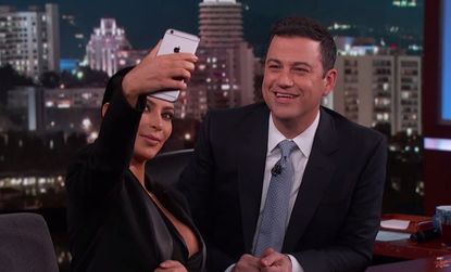 Kim Kardashian gives selfie lessons