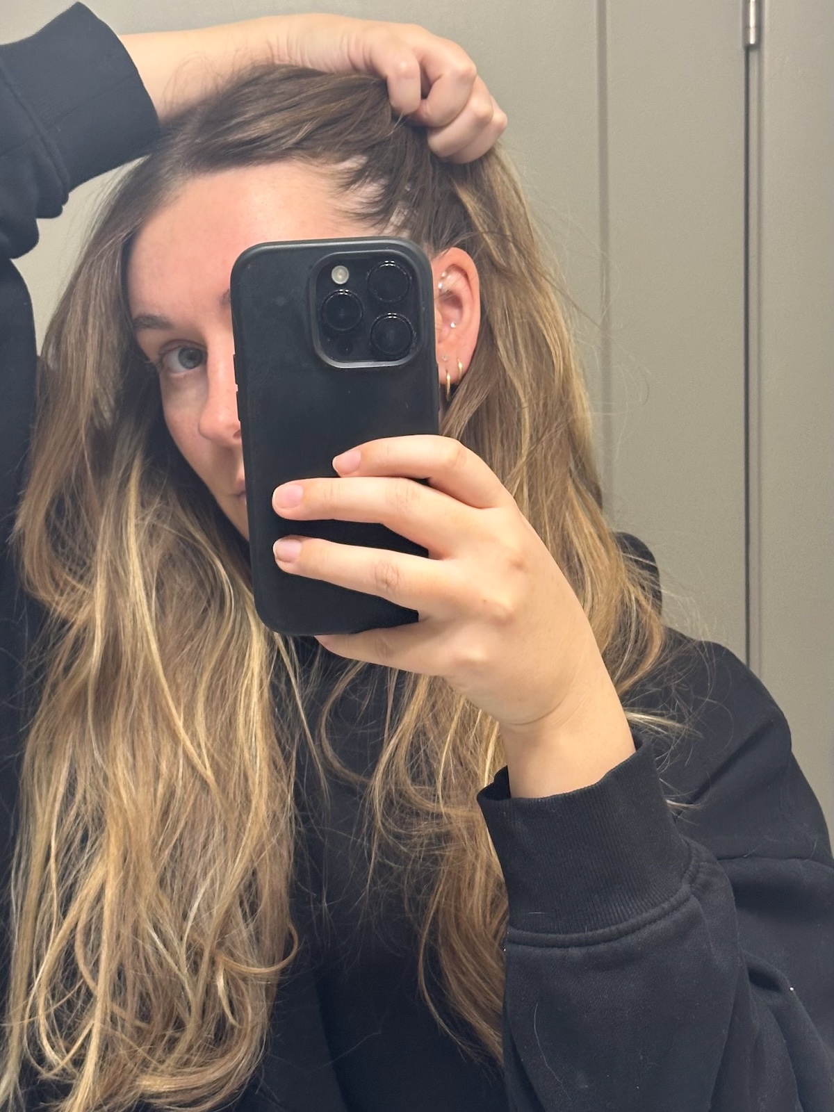 Beauty editor Kaitlyn McLintock wearing ear seeds