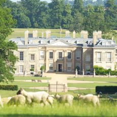 The exterior of Althorp House with sheep in the foreground