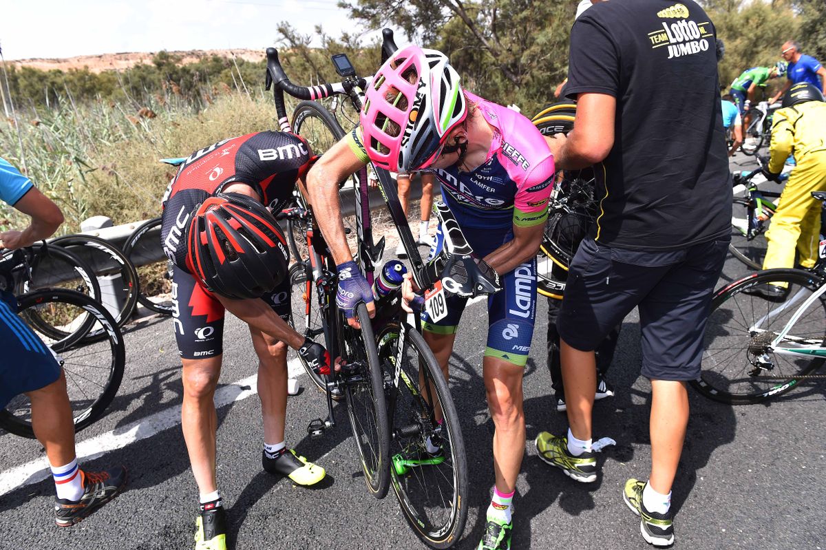De Marchi and Koshevoy try to untangle their bikes after a crash