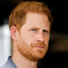 Prince Harry looks pensive, he is shown with his family, Meghan Markle, Prince Archie, Princess Lilibet in the garden of their Montecito home