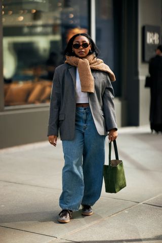 woman wearing blazer, white t-shirt, cardigan, and jena s