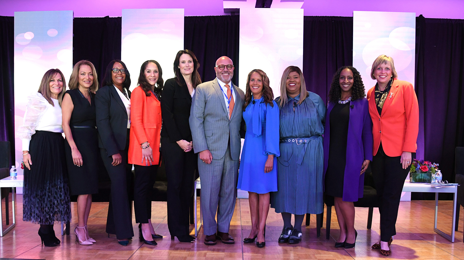 At The WICT Network/NAMIC/Kaitz Foundation Diversity Town Hall (l. to r.): Maria E. Brennan, WICT Network; Michelle Ray, Kaitz; Rhonda Nesmith Crichlow, Charter; Loren Hudson, Comcast Cable; Ann McGlennen, Midco; Michael Powell, NCTA; moderator Suzanne Malveaux of CNN; Kia Painter, Cox; Aisha Thomas-Petit, AMC Networks; and Sandra K. Howe, WICT Network.