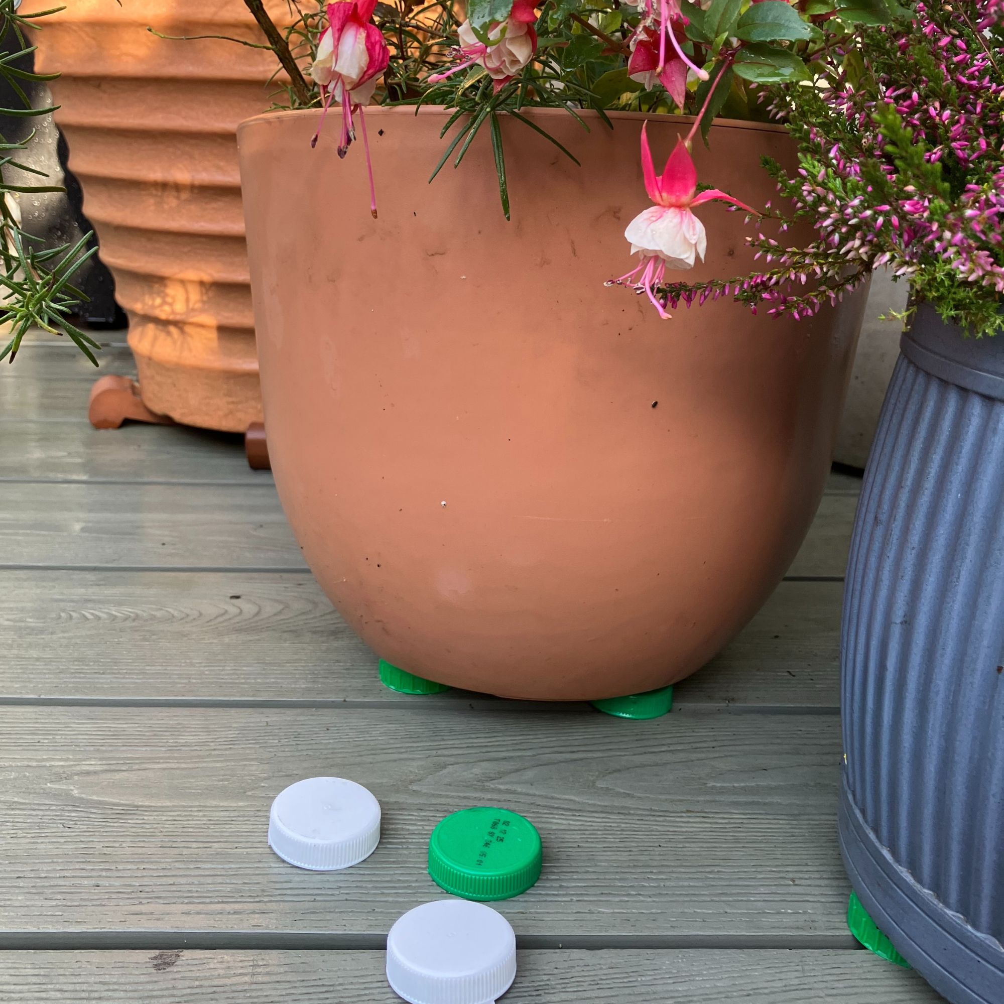 pot feet using milk bottle lids