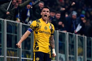 Lautaro Martinez of FC Internazionale celebrates with teammates after scoring his team's first goal during the Serie match between Inter and Genoa at Stadio Giuseppe Meazza on February 22, 2025 in Milan, Italy.