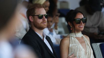 Prince Harry and Meghan Markle attend a charity polo game in Nigeria