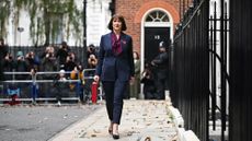 Britain's Chancellor of the Exchequer Rachel Reeves carries the red Budget Box as she leaves 11 Downing Street