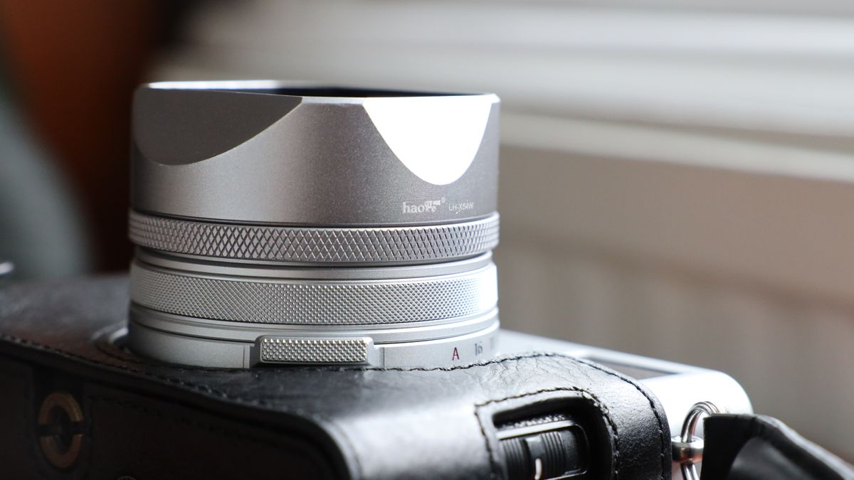 Fujifilm X100VI camera on a wooden table