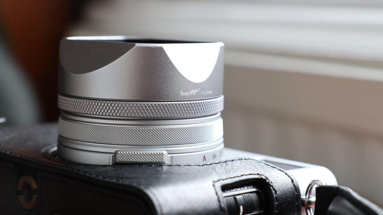 Fujifilm X100VI camera on a wooden table